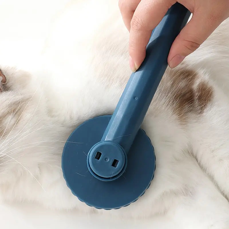 Cepillo removedor con función de masaje para el aseo de pelo desaliñado y flotante; ideal para perros y gatos